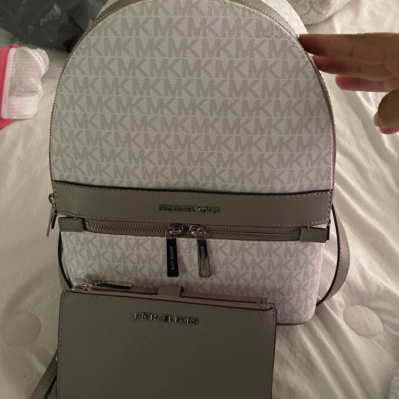 Michael Kors backpack and wristlet